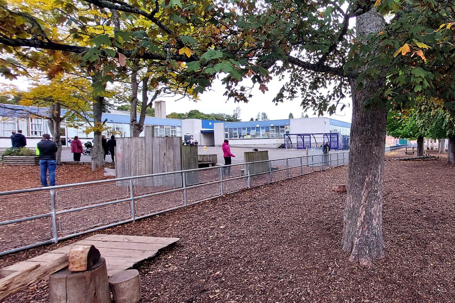 An area of some climate ready school grounds covered in soil and mulch.