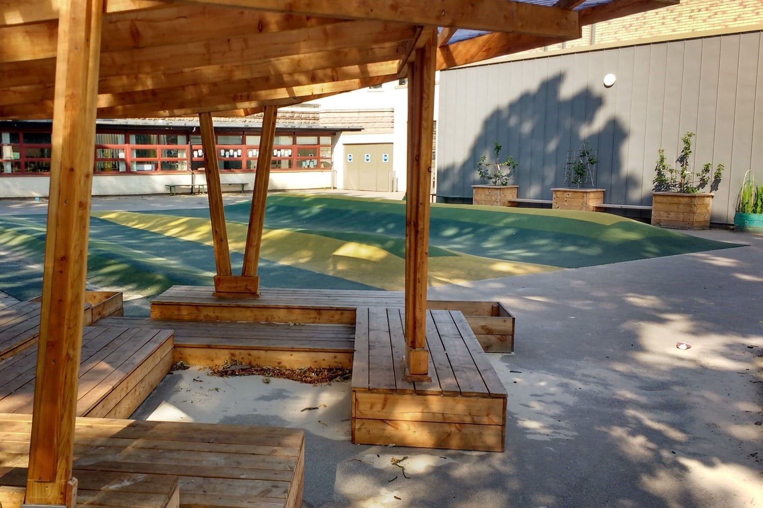 An area of sheltered seating in some climate ready school grounds.