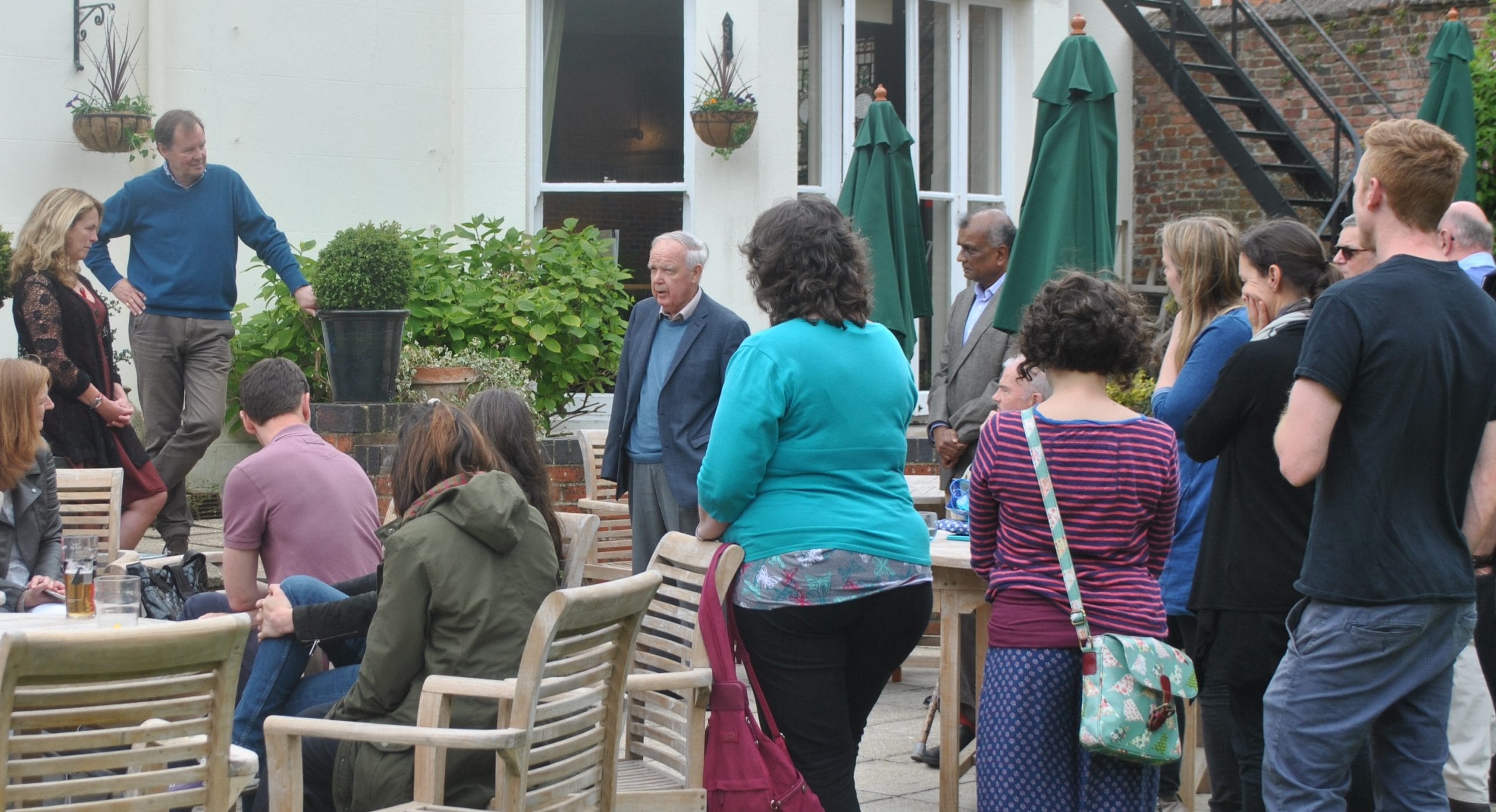 Sir Bob Reid with other guests at a party