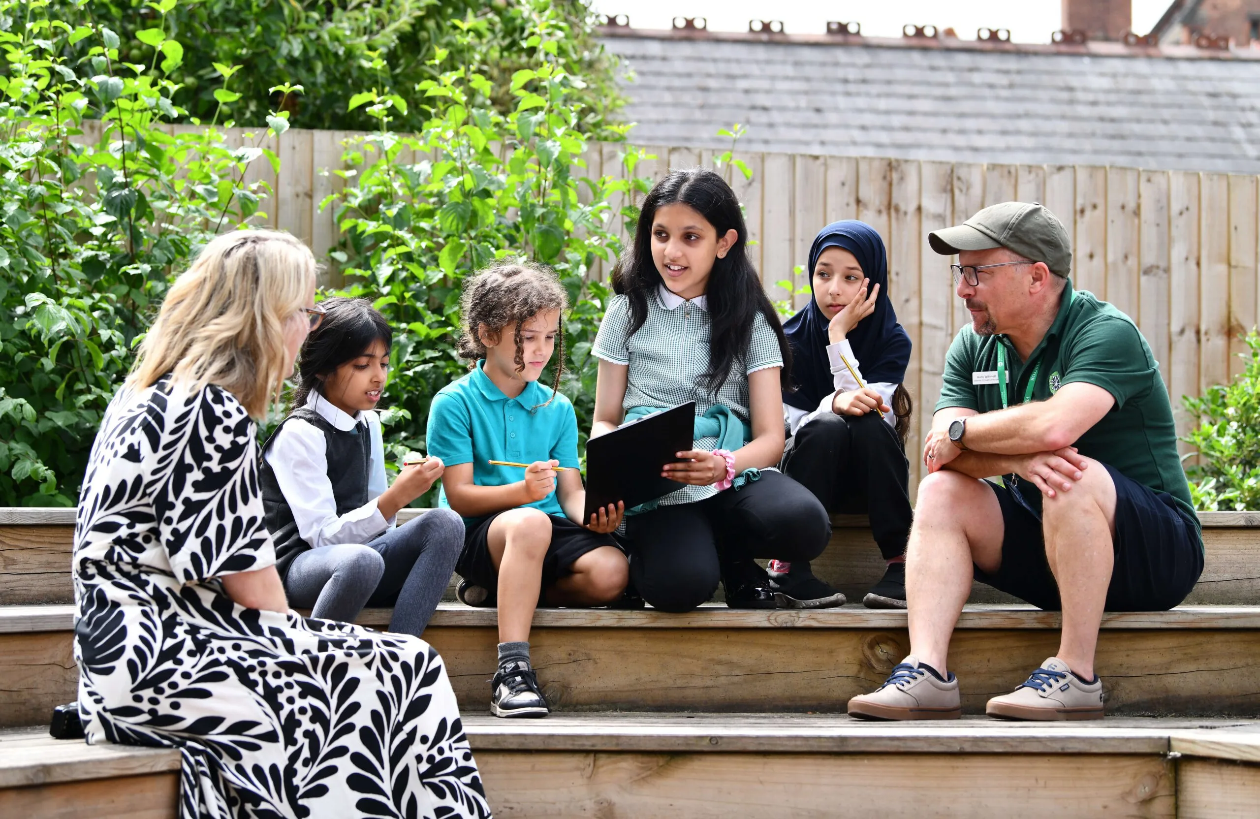Children engaged in outdoor learning activities.